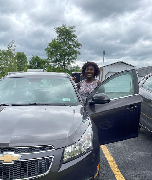 lady getting in car